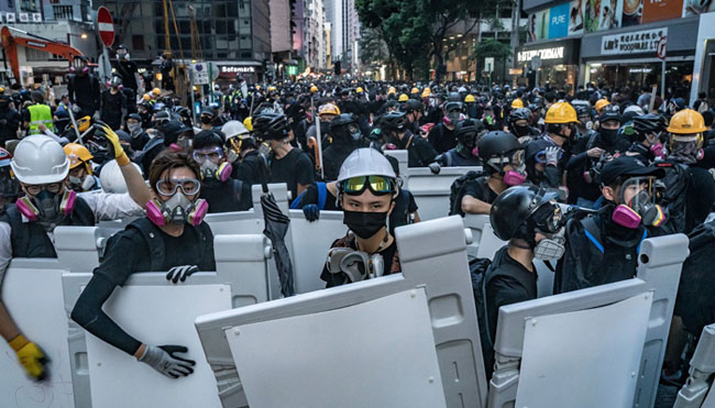 US President Donald Trump signs legislation to support pro-democracy protesters in Hong Kong