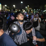More than 30 civilians and police were injured in anti-government protests near the Royal Palace in Thailand
