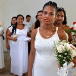 Brides wear traditional white wedding dresses for the wedding of their husbands to come to prison inmates