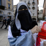 Vote to reject the March 7 referendum on a full face mask and burqa ban