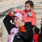 Besieged city of Homs by Syrian government forces evacuation of women and children allowed