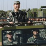 President Xi Jinping wearing military dressed on a military car last day inspected 12,000 soldiers' parade