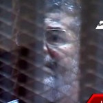 Former Egyptian president Mohammad Mursi were presented to the court in jail -like cage