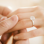 How did the tradition of giving a diamond engagement ring started?