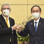 Prime Minister Suga Yoshihide and IOC chief Thomas Bach