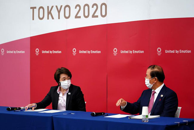 Tokyo Olympic Organizing Committee Chairman Seiko Hashimoto and Executive Committee Director General Toshiro Muto