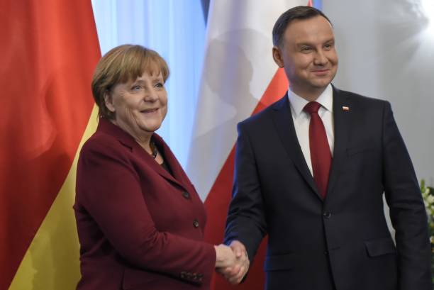 Polish President Andrzej Duda and German Chancellor Angela Merkel